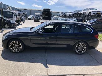 Voiture accidenté BMW 3-serie 318i touring automaat veel opties 70 dkm 2019/4